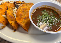 Birria tacos with consommé